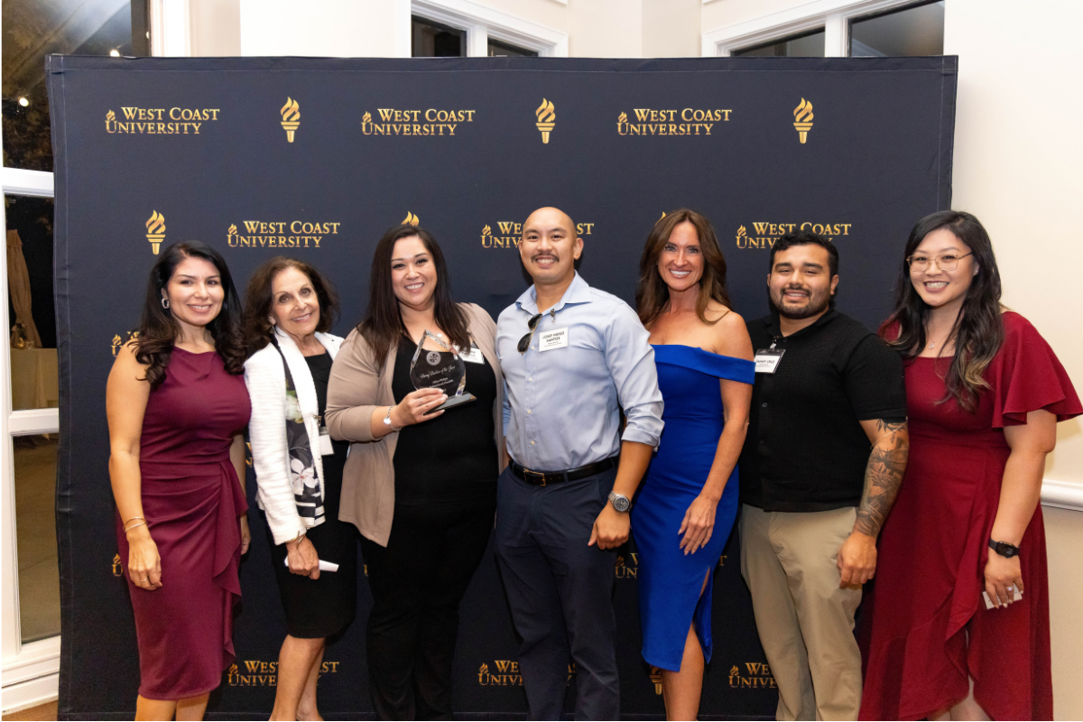 Clarissa Padilla, Chief Nursing Officer at Aliso Ridge Behavioral Health, accepting the Hiring Partner of the Year Award